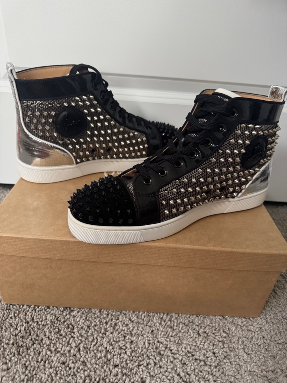 Christian Louboutin Louis Orlato Flat Studded High-Top Sneakers.